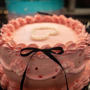 Pink Frosted Cake with Ribbon